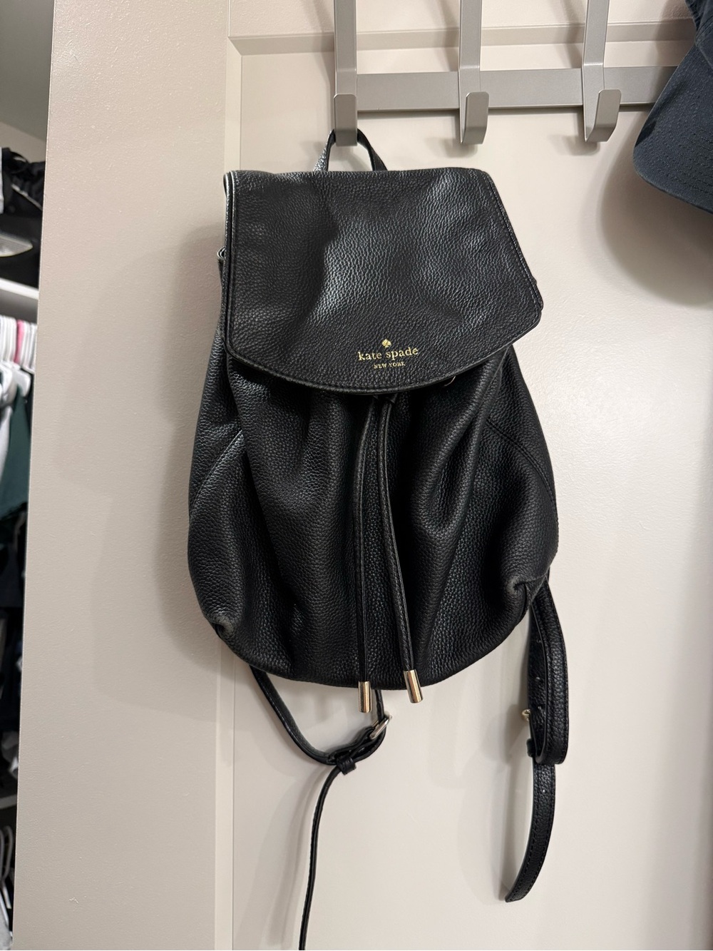 kate spade Black Pebbled Leather Drawstring Backpack with Gold Hardware